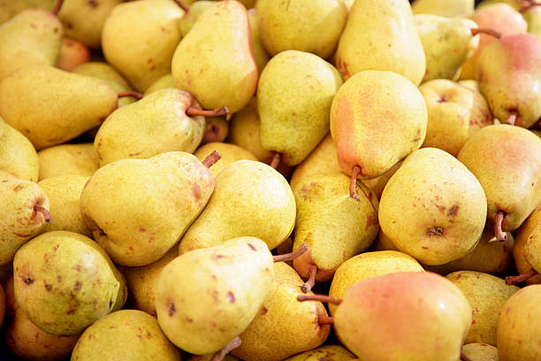 pear natural food pear natural food,  morning market in SF,CA,USA bartlett pear stock pictures, royalty-free photos & images