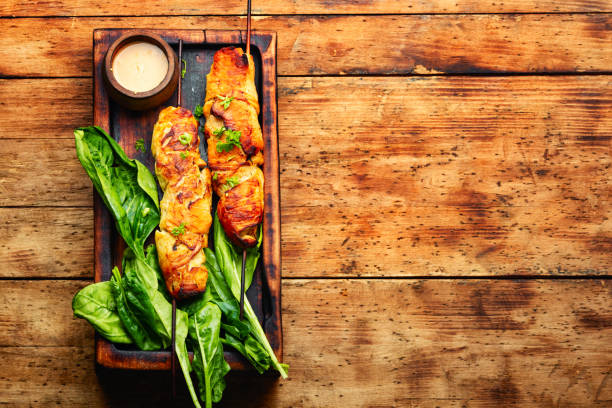 Chicken breast fried on skewers.