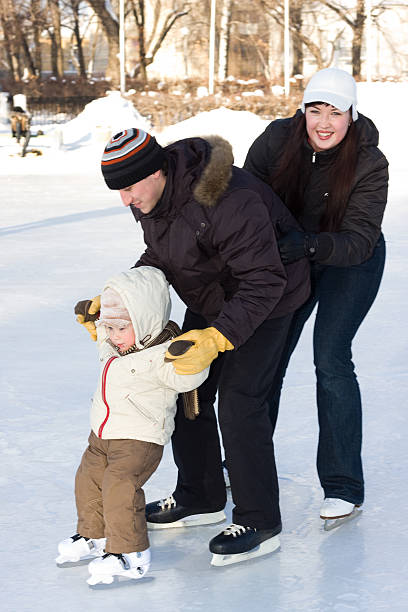 istock Family skating at the rink 145054232