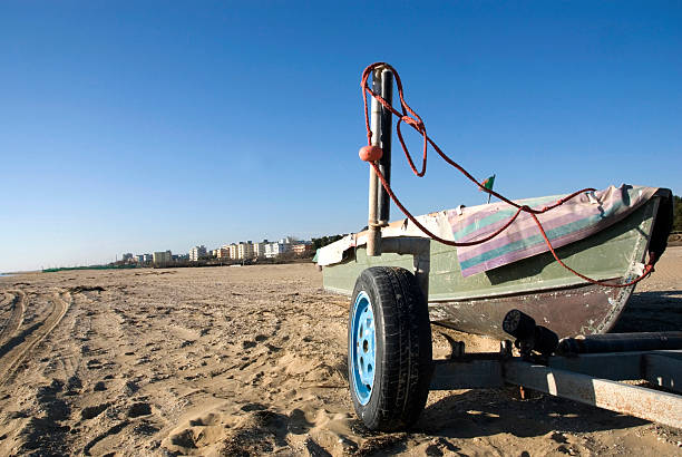 istock Old boat on the beach in Italy 145054378