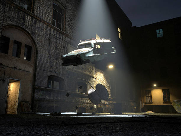 Alien abduction / recycling A ufo beams home an old car wreck in the night movie scene stock pictures, royalty-free photos & images