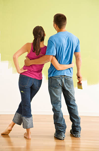 istock Couple admiring paint job. 145055490
