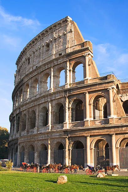 Close-up of The Colosseum on a sunny day Exterior view of the Colosseum in Rome, Italy. colloseum rome stock pictures, royalty-free photos & images