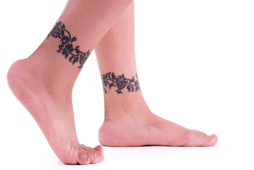 Walking Feet With Matching Ankle Tattoos Stock Photo - Download Image Now -  Adult, Art, Art And Craft - iStock