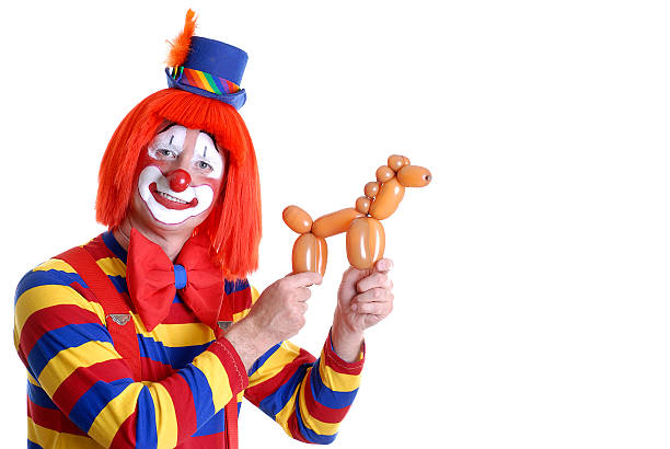 Circus Clown Displaying a Horse Balloon Animal
