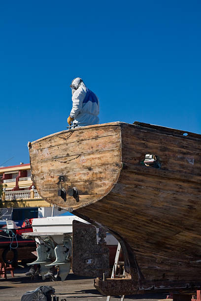 barca in cantiere navale - nautical vessel wood sailing ship repairing foto e immagini stock