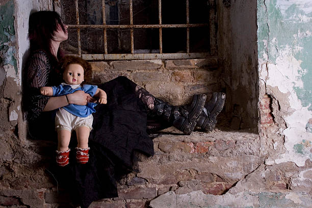istock girl with a doll 145056131