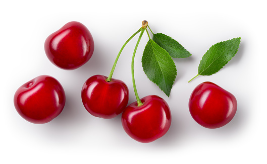 Cherries. Cherry isolated. Cherries top view. Sour cherry with leaves on white background. With clipping path.
