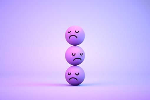 3d rendering of emoji with sad face on purple color background.