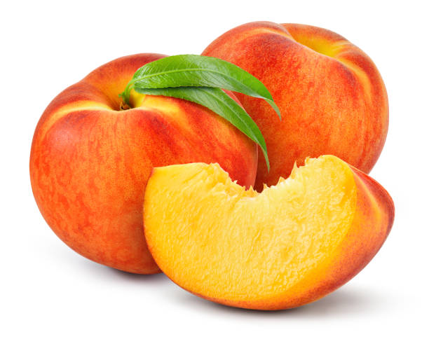 istock Peach isolated. Two peaches with a slice on white background. Peach fruit with leaf cut out. With clipping path. Full depth of field. 1450562507