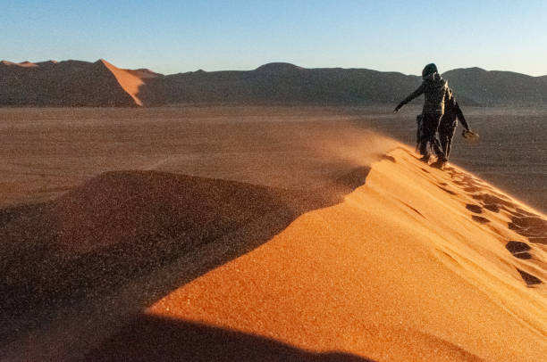 istock Climbing Dune 45 at sunrise 1450568544