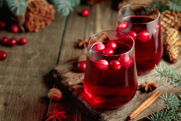 istock Christmas drink with spices and cranberries. 1450568720