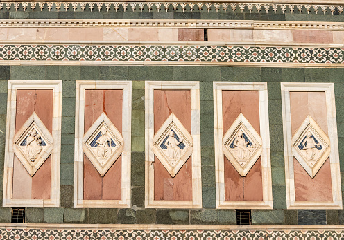 Ornate moorish arched columns carved from stone in an islamic masque