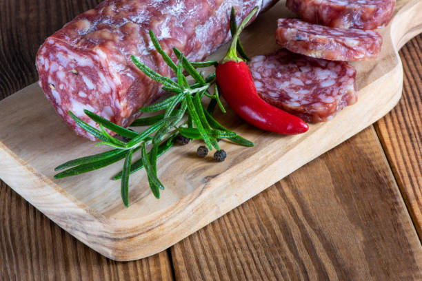 istock Marble cutting board with sliced salami on it 1450572732