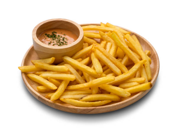 istock French fries with sauce on white background. clipping path 1450577144