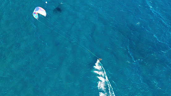 Aerial top view of a kite surfer on a autumn day at El Medano beach, Tenerife (Canary Islands)