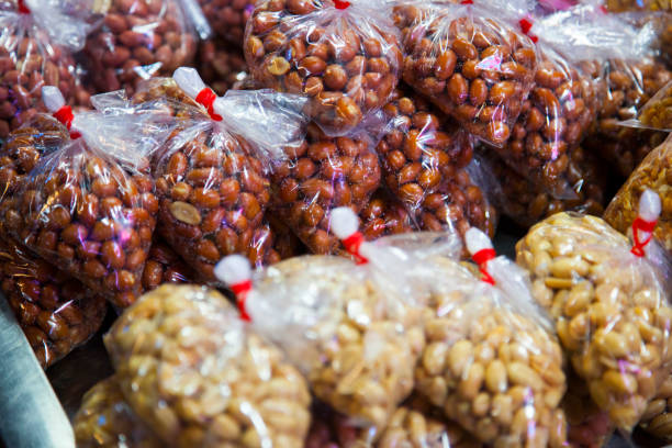 istock Closeup, grocery store, on shelves, oily, peanuts 1450600101