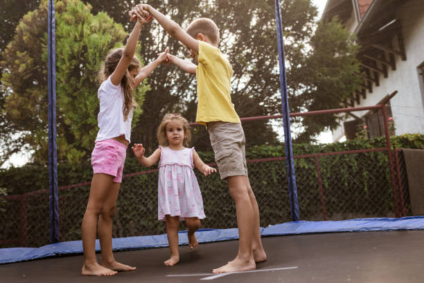 istock Beautiful children enjoying summer 1450600963