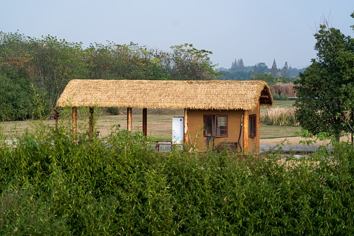 A small hut in the middle of the field