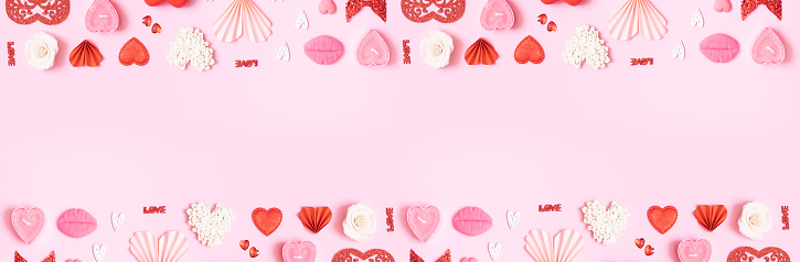 Banner with pattern from hearts and valentines day symbols elements top view. Creative valentines day flat lay background.