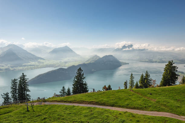 Hiking and bicycle trail over lake Lucerne on Mountain Rigi stock photo