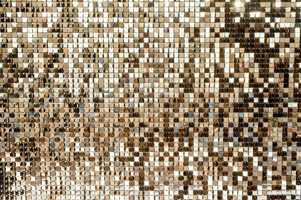 istock Golden metal shiny pieces making festive abstract texture 1450623806
