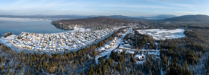 Panoramic Aerial View of Lac St-Joseph in Winter Season, Quebec, Canada. This lake is located 30 minutes away from Quebec City. Domaine de la riviere aux pins (DRAP) and Lac Saint-Joseph, Fossambault-sur-le-Lac, Quebec, Canada