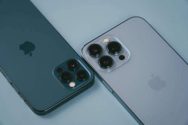 Apple Iphone 13 Pro Max Vs 12 Pro Stock Photo - Download Image Now