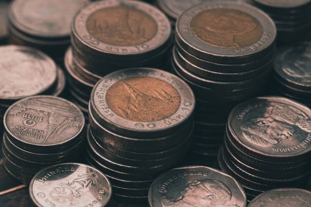istock Closeup of Thai baht on stack - financial saving concept 1450629466