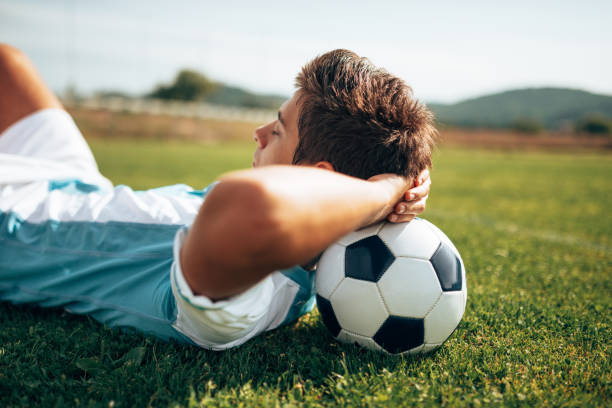 istock argentinian soccer player resting on the soccer ball 1450632342