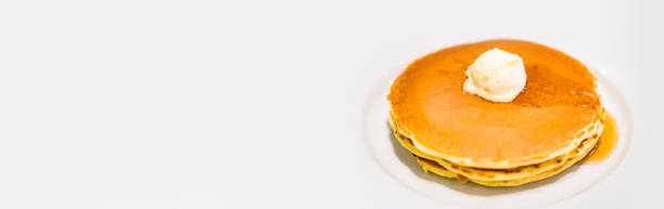 istock Pancakes with plenty of syrup 1450640509