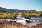 Crossing a river in a 4x4 - The Kimberley, Australia