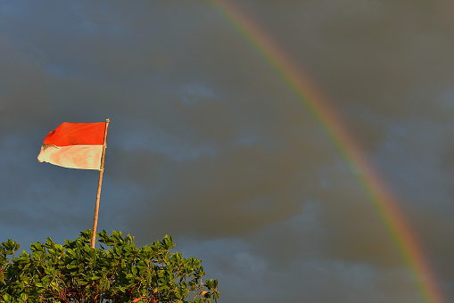 The Polish flag in the sky, the flag of old Poland, the Polish flag in the wind. Destroyed