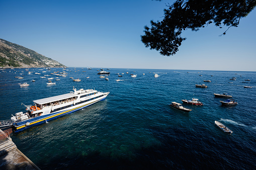 Passenger liner, boats and yachts at Positano on Italy's Amalfi Coast.