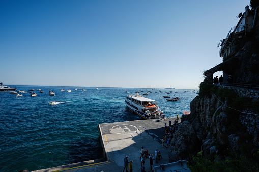 Passenger liner, boats and yachts at Positano on Italy's Amalfi Coast.