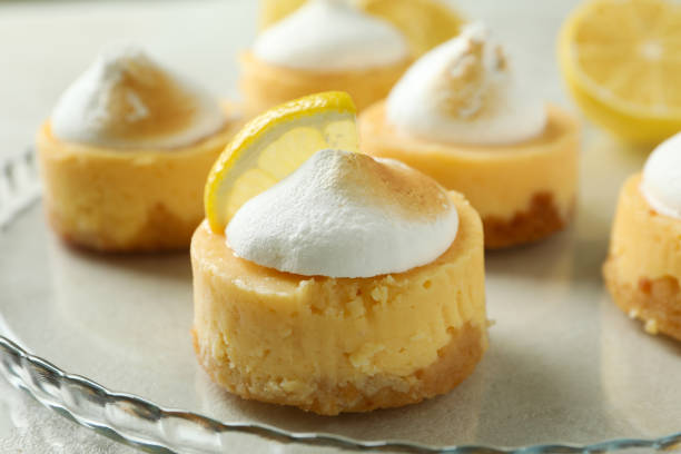 istock Tray with tasty lemon cupcakes, close up 1450649735