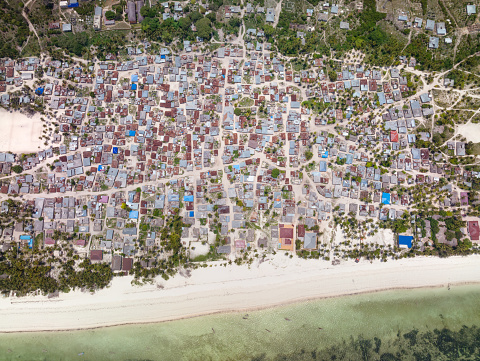 Aerial view of the Slums, Township Poor Houses Favelas in Paje Village, Zanzibar, Tanzania, Africa. Converted from RAW.