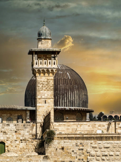 Dome & Minaret Aerial View of Al Aqsa Mosque Dome & Minaret from top of Western Waling wall. The mosque is in the Islamic Quarters while picture was shot from top of the hill near waling wall. The view is very beautiful, and majestic blends nicely against the backdrop of late evening summer skies of the holy land. al aksa mosque stock pictures, royalty-free photos & images