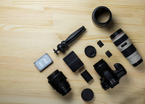 istock Flat lay composition with equipment for professional photographer on the table. 1450665118