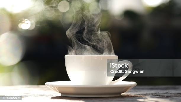 https://media.istockphoto.com/id/1450665898/photo/close-up-white-coffee-cup-mug-with-steaming-smoke-of-coffee-on-old-wooden-table-in-morning.jpg?s=612x612&w=is&k=20&c=MRs02nG7cRfht47aL_ozbOsUWmJkUzHXazGA0U4cInM=
