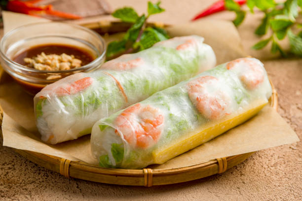 istock Fresh Spring Roll with shrimps, Vietnamese Food macro close up 1450670176
