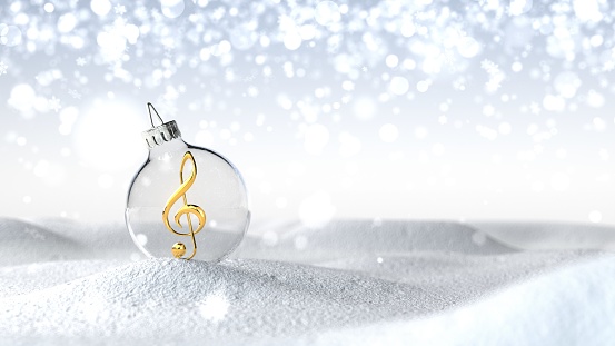 A golden clef in the Christmas bauble in the snow. 3d illustration.