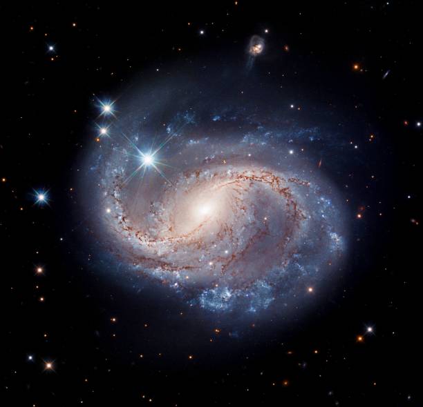 istock Beautiful spiral galaxy with bright stars. Space, universe backdrop. 1450672405