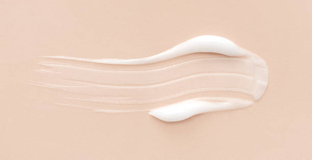 istock cosmetic smears cream texture on beige background 1450676844