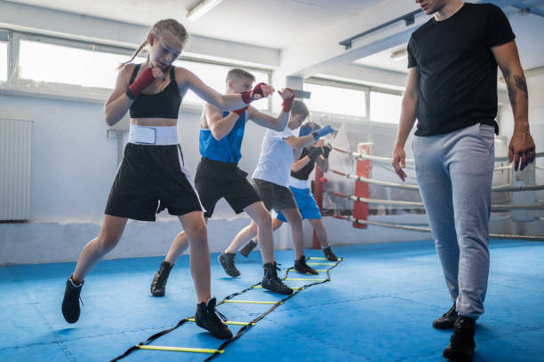istock Group Of Kids Training Boxing 1450676882