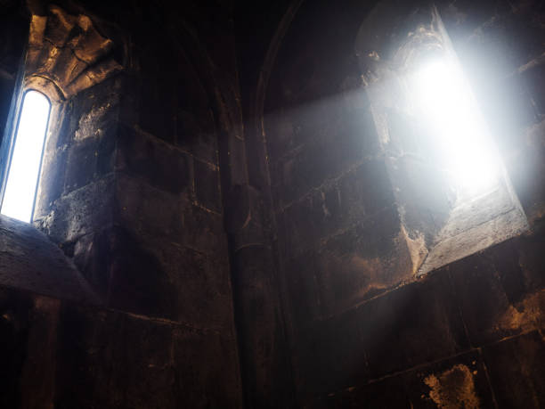 istock Divine light , the interior of an ancient church, 1450680132
