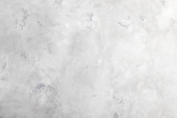 Decorative Venetian plaster on a white wall. Background texture