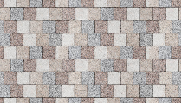 Paving slabs pattern, top view. Seamless background texture Colorful paving slabs, pedestrian lane paving, top view. Seamless background photo texture cobblestone stock pictures, royalty-free photos & images