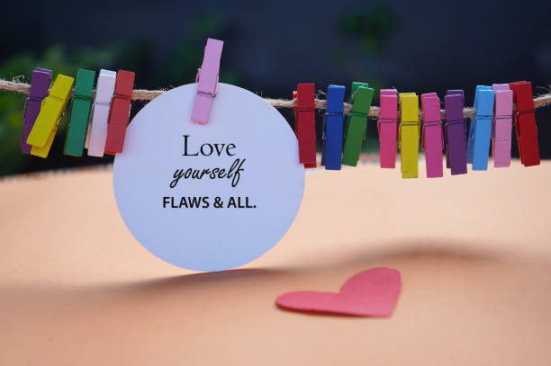 istock Note to self with red heart - Love yourself flaws and all. 1450680627