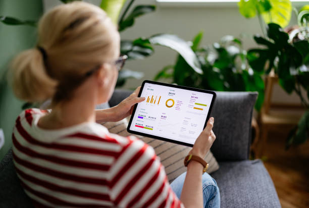 istock High Angle View Of An Anonymous Businesswoman Using A Digital Tablet At Home 1450681952